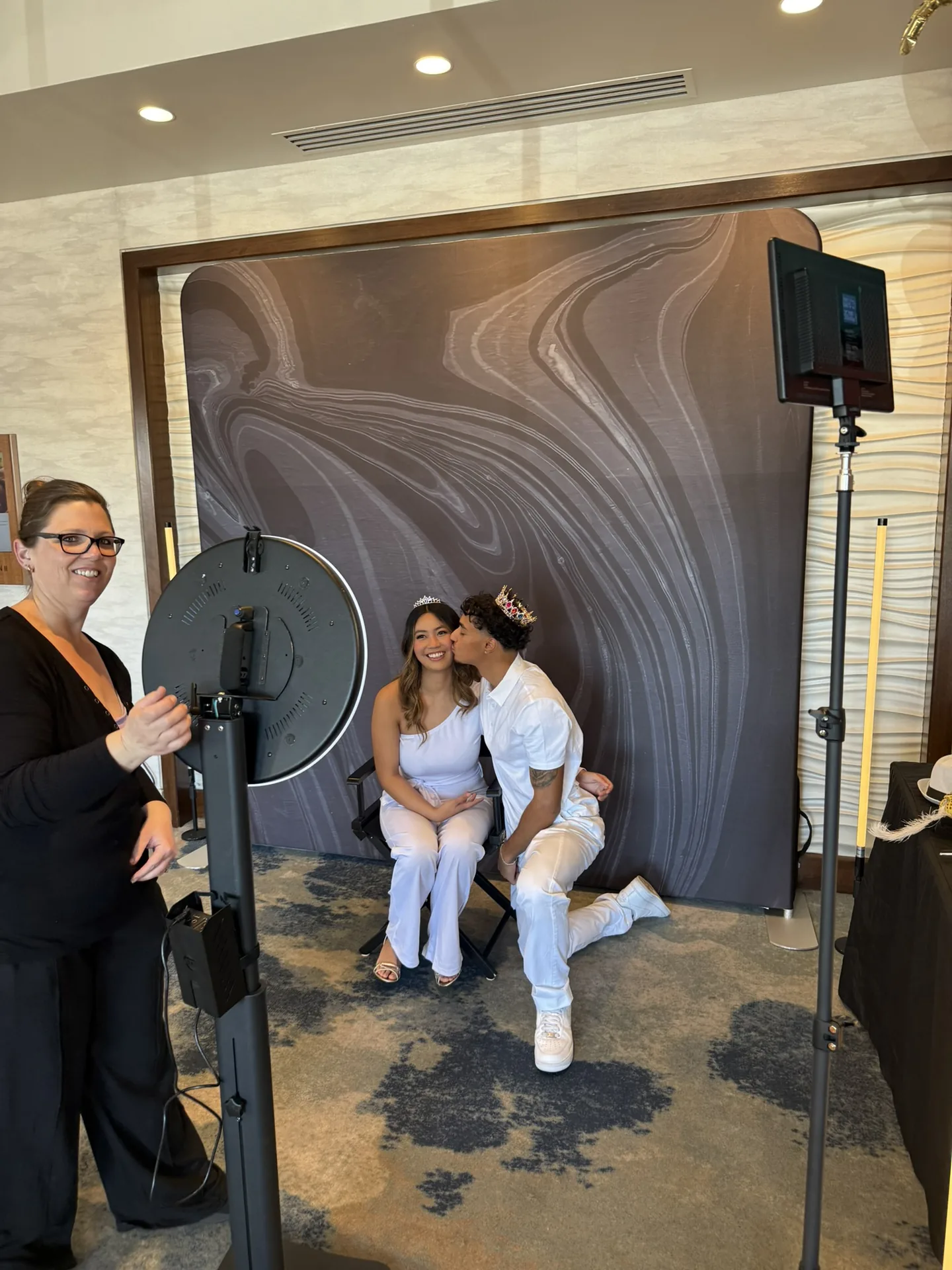 Studio photo booth couple at hotel with marble backdrop Tucson